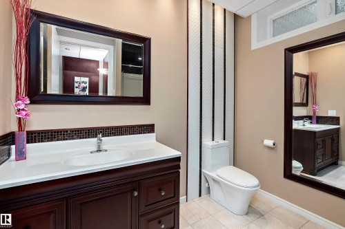Full bath with vanity and light tile patterned floors - 169 Callaghan Drive, Edmonton, AB - Indoor Photo Showing Bathroom