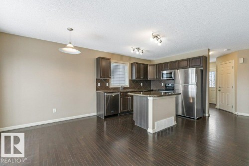 130 Keystone Crescent, Leduc, AB - Indoor Photo Showing Kitchen With Stainless Steel Kitchen