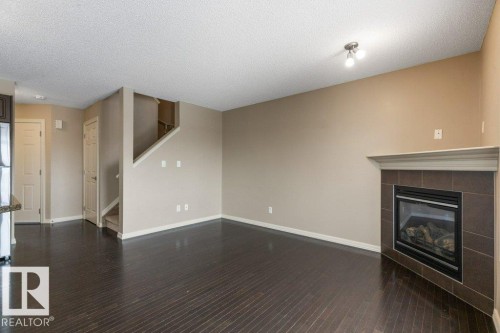 130 Keystone Crescent, Leduc, AB - Indoor With Fireplace