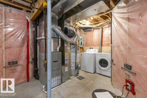 130 Keystone Crescent, Leduc, AB - Indoor Photo Showing Laundry Room
