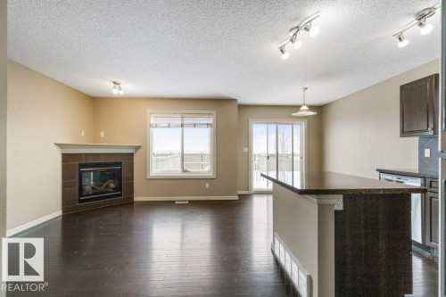 130 Keystone Crescent, Leduc, AB - Indoor With Fireplace