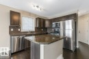 130 Keystone Crescent, Leduc, AB  - Indoor Photo Showing Kitchen With Stainless Steel Kitchen With Upgraded Kitchen 