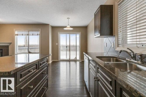 130 Keystone Crescent, Leduc, AB - Indoor Photo Showing Kitchen With Double Sink