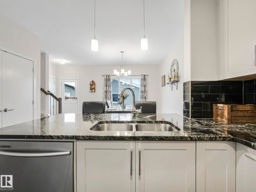 725 Berg Loop, Leduc, AB - Indoor Photo Showing Kitchen With Double Sink