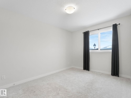725 Berg Loop, Leduc, AB - Indoor Photo Showing Other Room