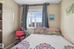 Bedroom featuring baseboards - 