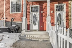 Entrance to property with stone siding and covered porch - 