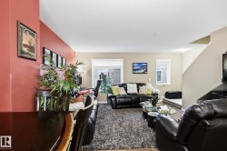 Living room featuring a textured ceiling - 