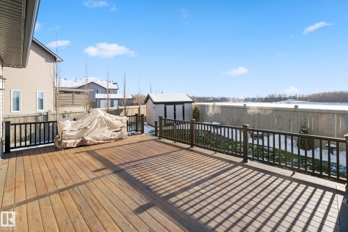 Wooden terrace featuring a shed and a residential view - 3904 5 Street, Edmonton, AB - Outdoor With Deck Patio Veranda With Exterior