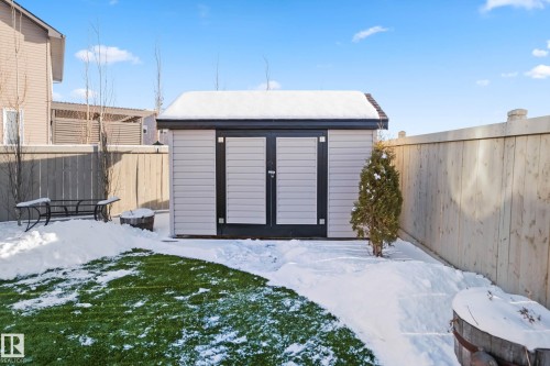 Snow covered structure with a storage unit and a fenced backyard - 3904 5 Street, Edmonton, AB - Outdoor With Exterior
