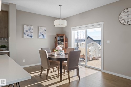 Dining room featuring baseboards and dark wood-style flooring - 3904 5 Street, Edmonton, AB - Indoor Photo Showing Dining Room