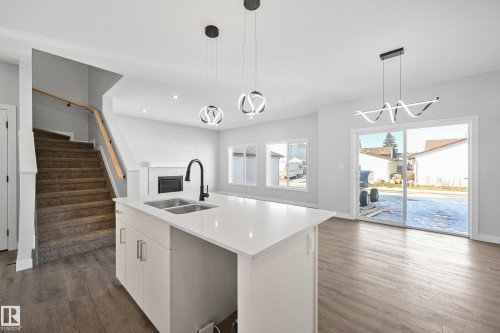 76 Maple Crescent, Gibbons, AB - Indoor Photo Showing Kitchen With Double Sink