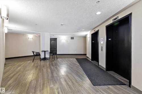Lobby with a textured ceiling - 2407 320 Clareview Station Drive, Edmonton, AB - Indoor Photo Showing Other Room