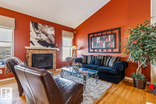 Vaulted Great Room with Gas fireplace - 38 3003 34 Avenue, Edmonton, AB - Indoor Photo Showing Living Room With Fireplace