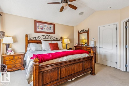 Bright Master bedroom with vaulted ceiling - 38 3003 34 Avenue, Edmonton, AB - Indoor Photo Showing Bedroom