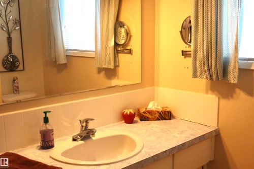 Bathroom featuring vanity - 5220 - 56 Street, Barrhead, AB - Indoor Photo Showing Bathroom