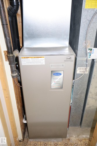 Utilities with heating unit - 5220 - 56 Street, Barrhead, AB - Indoor Photo Showing Basement