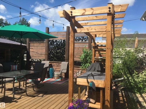 Deck with outdoor dining space and grilling area - 5220 - 56 Street, Barrhead, AB - Outdoor With Deck Patio Veranda