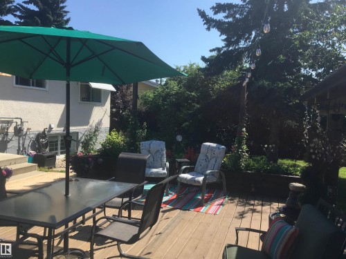 Wooden deck with outdoor dining area - 5220 - 56 Street, Barrhead, AB - Outdoor With Deck Patio Veranda