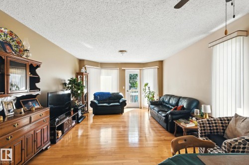 2 14428 Miller Blvd Nw, Edmonton, AB - Indoor Photo Showing Living Room