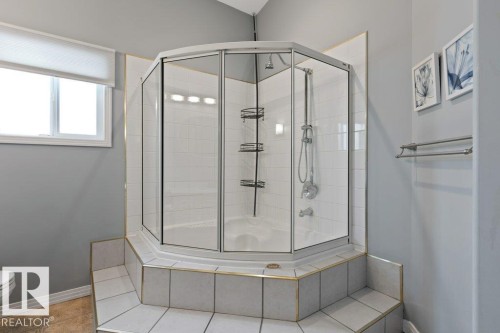 Bathroom featuring a shower stall and tile patterned floors - 8 Osborne Close, St. Albert, AB - Indoor Photo Showing Bathroom
