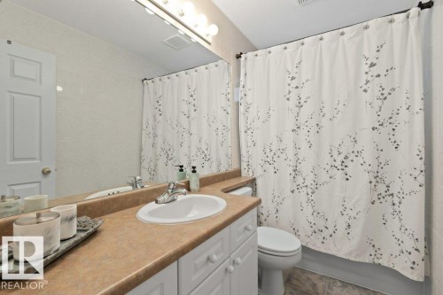 Full bathroom with vanity and shower / tub combo with curtain - 8 Osborne Close, St. Albert, AB - Indoor Photo Showing Bathroom