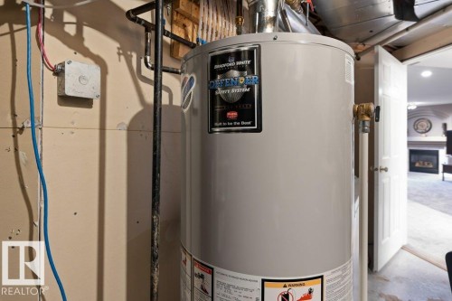 Utilities with gas water heater - 8 Osborne Close, St. Albert, AB - Indoor Photo Showing Basement