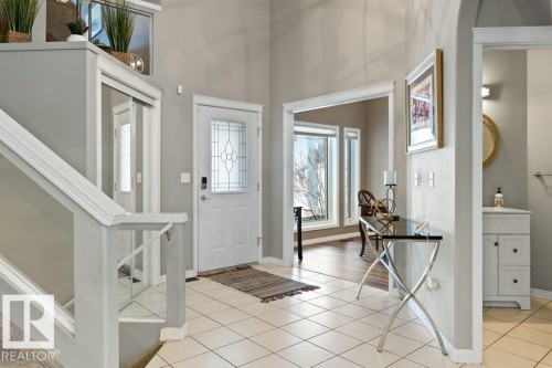 Entryway with stairs and light tile patterned flooring - 8 Osborne Close, St. Albert, AB - Indoor Photo Showing Other Room