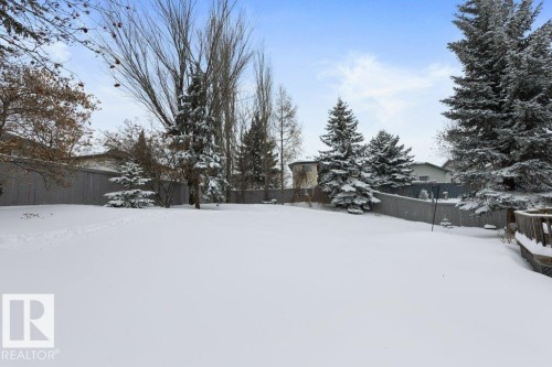 View of snowy yard - 8 Osborne Close, St. Albert, AB - Outdoor
