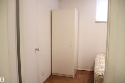 View of closet - 11250 72 Avenue, Edmonton, AB - Indoor Photo Showing Other Room