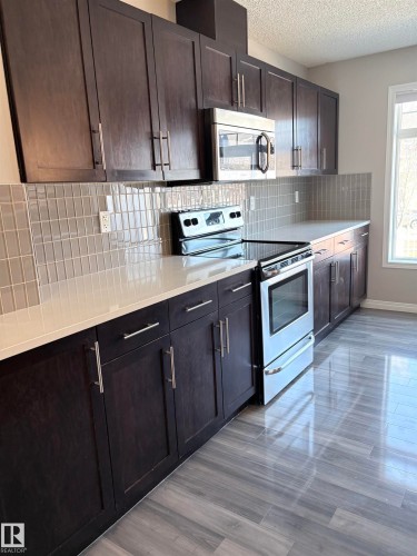 Edmonton, AB - Indoor Photo Showing Kitchen