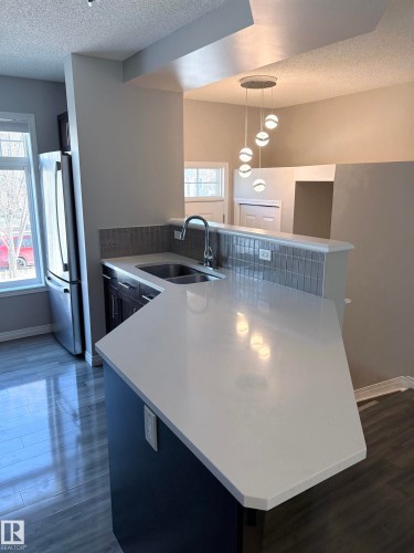 Edmonton, AB - Indoor Photo Showing Kitchen With Double Sink