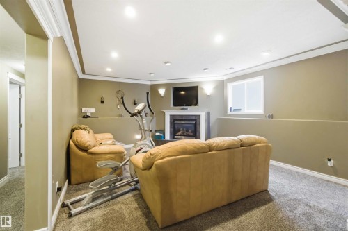 1304 Oakland Crescent, Devon, AB - Indoor With Fireplace