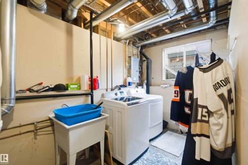 1304 Oakland Crescent, Devon, AB - Indoor Photo Showing Laundry Room