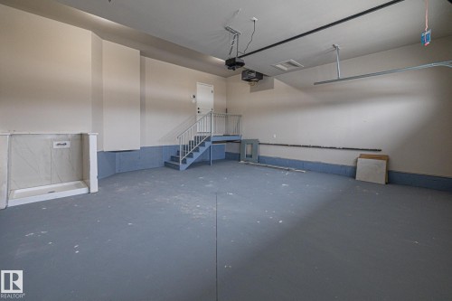 View of garage - 132 Edgewater Circle, Leduc, AB - Indoor Photo Showing Garage