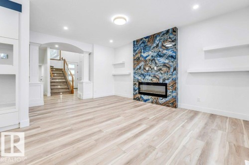 219 Crystal Creek Drive, Leduc, AB - Indoor With Fireplace