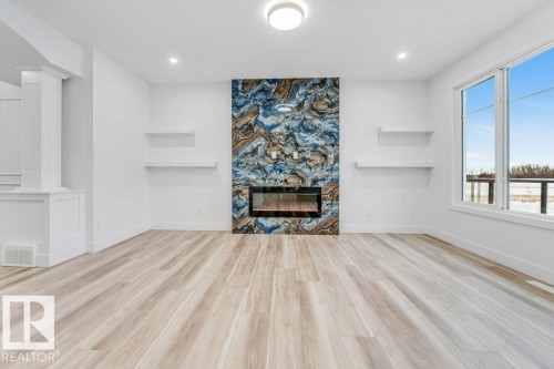 219 Crystal Creek Drive, Leduc, AB - Indoor With Fireplace