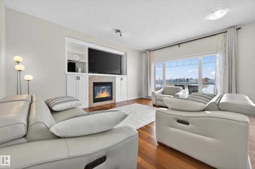 7507 Speaker Way, Edmonton, AB - Indoor Photo Showing Living Room With Fireplace