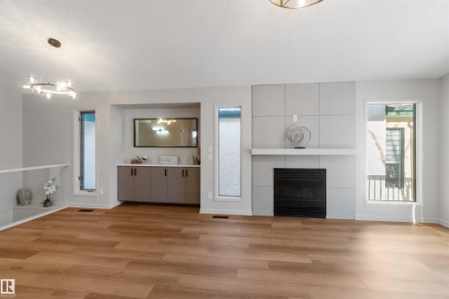 1034 Carter Crest Road, Edmonton, AB - Indoor Photo Showing Living Room With Fireplace