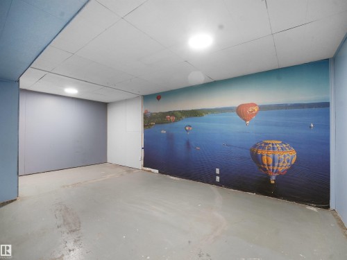 View of finished below grade area - 10329 132 Avenue, Edmonton, AB - Indoor Photo Showing Basement