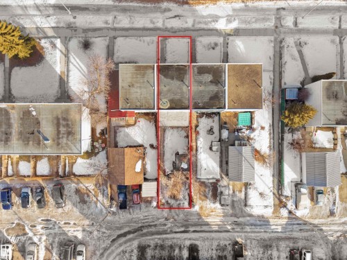 Aerial view of property and surrounding area with property parcel outlined - 10329 132 Avenue, Edmonton, AB - 