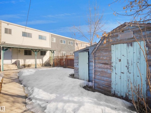 Yard covered in snow featuring a shed - 10329 132 Avenue, Edmonton, AB - Outdoor