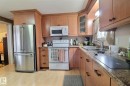 290 Juniper Crescent, Edmonton, AB  - Indoor Photo Showing Kitchen With Double Sink 