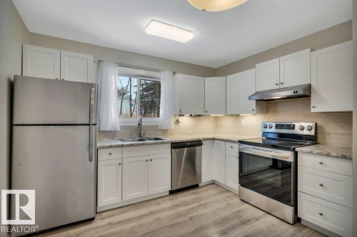 116 Kaskitayo Crest, Edmonton, AB - Indoor Photo Showing Kitchen With Double Sink