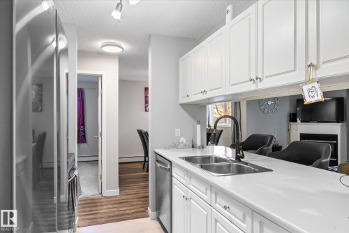 141 17447 98A Avenue, Edmonton, AB - Indoor Photo Showing Kitchen With Double Sink