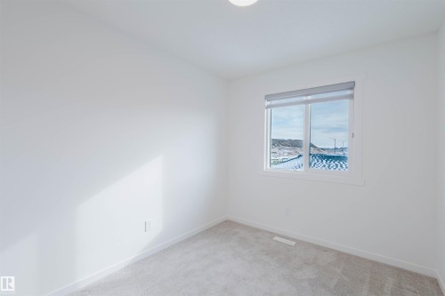 2 1237 Keswick Drive, Edmonton, AB - Indoor Photo Showing Other Room