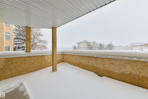 View of snow covered patio - 232 15499 Castle Downs Road, Edmonton, AB - Outdoor With Exterior