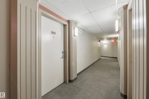 Hallway with a drop ceiling and carpet flooring - 232 15499 Castle Downs Road, Edmonton, AB - Indoor Photo Showing Other Room