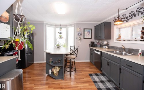 9819 106 Street, Westlock, AB - Indoor Photo Showing Kitchen With Double Sink