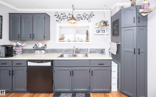 9819 106 Street, Westlock, AB - Indoor Photo Showing Kitchen With Double Sink